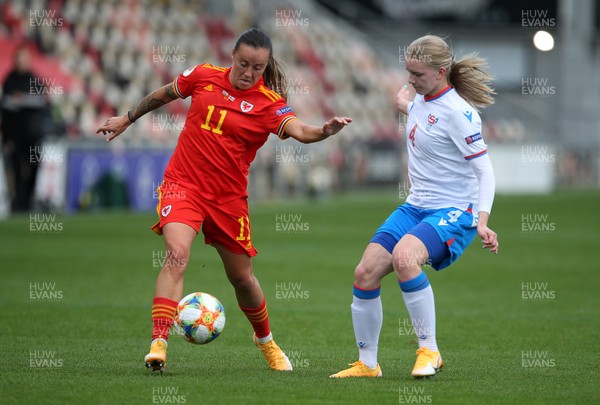 221020 - Wales Women v Faroe Islands - European Women's Championship Qualifier - Natasha Harding of Wales is challenged by Birita Ryan of Faroe Islands