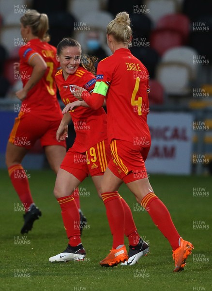 221020 - Wales Women v Faroe Islands - European Women's Championship Qualifier - Lily Woodham of Wales celebrates scoring a goal with Sophie Ingle