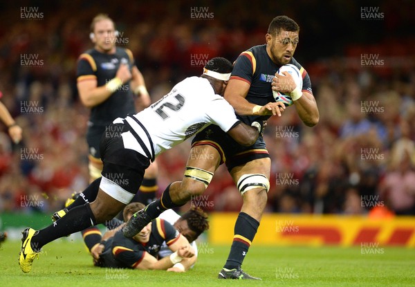 011015 - Wales v Fiji - Rugby World Cup 2015 -Taulupe Faletau of Wales is tackled by Lepani Botia of Fiji