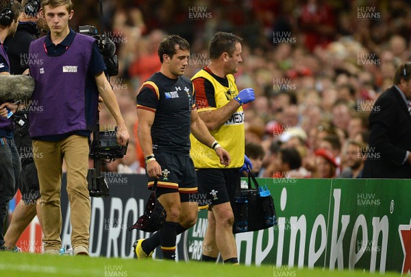 011015 - Wales v Fiji - Rugby World Cup 2015 -Matthew Morgan of Wales  leaves the field with doctor Geoff Davies