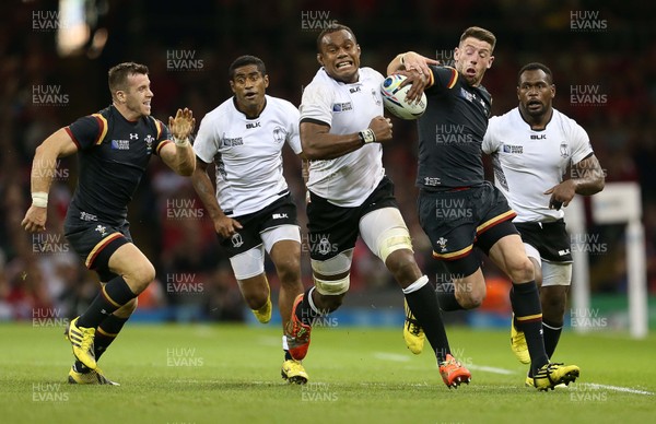 011015 - Wales v Fiji - Rugby World Cup - Alex Cuthbert of Wales tries to tackle Leone Nakarawa of Fiji