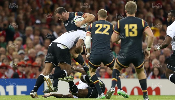 011015 - Wales v Fiji - Rugby World Cup - Jamie Roberts of Wales is tackled by Peni Ravia of Fiji