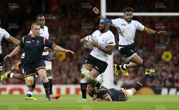 011015 - Wales v Fiji - Rugby World Cup - Tevita Cavubati of Fiji is tackled by Sam Warburton of Wales