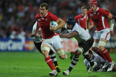 02.10.11 - Wales v Fiji - Rugby World Cup 2011 - Sam Warburton of Wales breaks through Leone Nakarawa of Fiji. 
