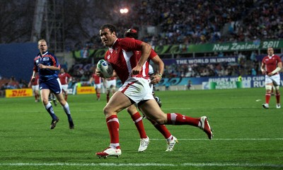 02.10.11 - Wales v Fiji - Rugby World Cup 2011 - Jamie Roberts of Wales runs in to score try. 