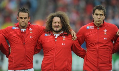02.10.11 - Wales v Fiji - Rugby World Cup 2011 - Lee Byrne, Adam Jones and Ryan Jones during the national anthems. 