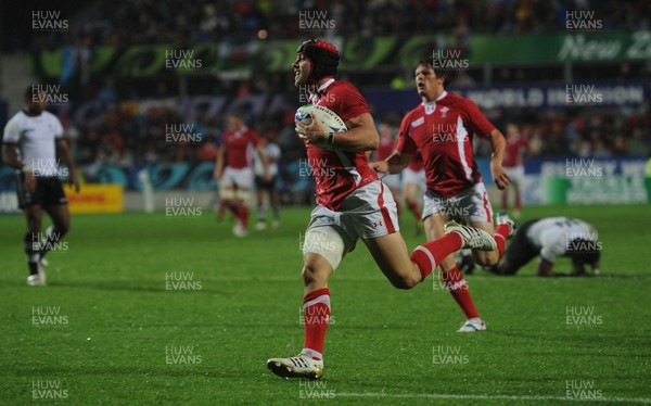 02.10.11 - Wales v Fiji - Rugby World Cup 2011 - Leigh Halfpenny of Wales runs in to score try. 
