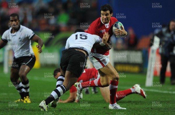 02.10.11 - Wales v Fiji - Rugby World Cup 2011 - Mike Phillips of Wales is tackled by Iliesa Keresoni of Fiji. 