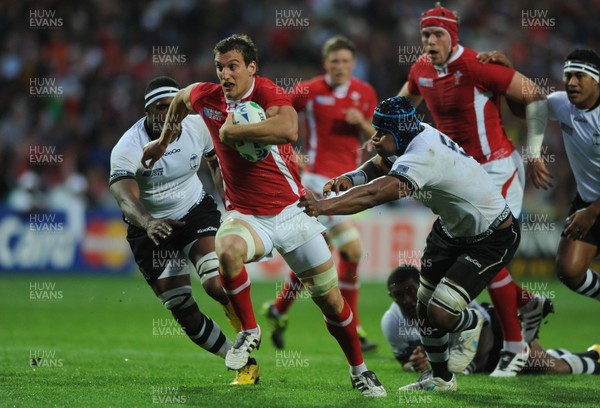 02.10.11 - Wales v Fiji - Rugby World Cup 2011 - Sam Warburton of Wales breaks through Leone Nakarawa of Fiji. 