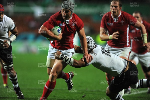 02.10.11 - Wales v Fiji - Rugby World Cup 2011 - Jonathan Davies of Wales breaks past Mala Ravulo of Fiji to score try. 