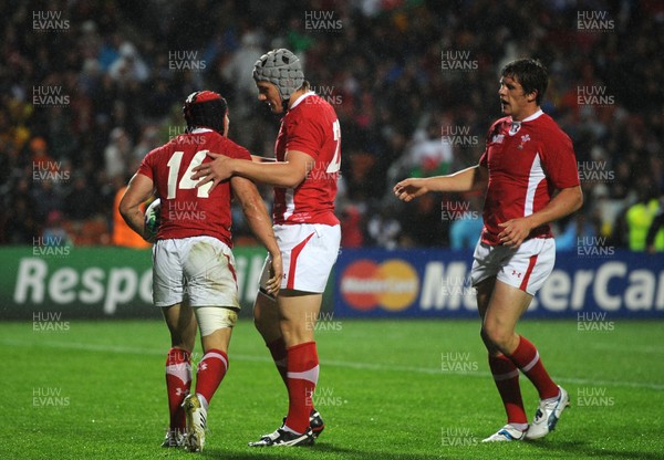 02.10.11 - Wales v Fiji - Rugby World Cup 2011 - Leigh Halfpenny of Wales celebrates his try with Jonathan Davies. 