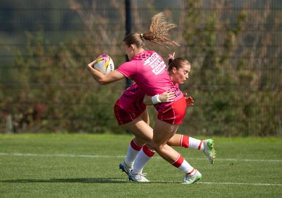 060925 - Wales v Fiji, Women’s Rugby World Cup - Lisa Neumann of Wales and Carys Cox of Wales during warm up