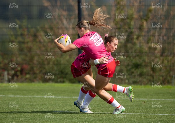 060925 - Wales v Fiji, Women’s Rugby World Cup - Lisa Neumann of Wales and Carys Cox of Wales during warm up