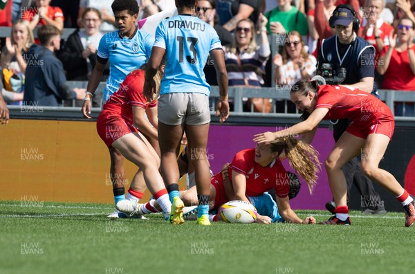 060925 - Wales v Fiji, Women’s Rugby World Cup - Carys Cox of Wales celebrates after she powers over to score the opening try