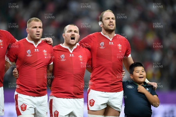 091019 - Wales v Fiji - Rugby World Cup - Pool D - Ross Moriarty, Ken Owens and Alun Wyn Jones of Wales during the anthem