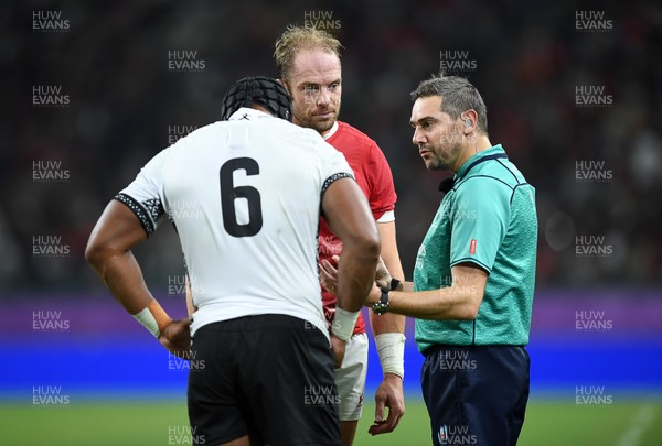 091019 - Wales v Fiji - Rugby World Cup - Pool D - Dominiko Waqaniburotu of Fiji is given a yellow card by Referee Jerome Garces