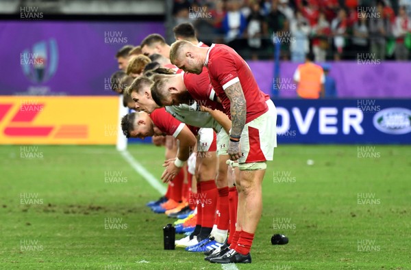 091019 - Wales v Fiji - Rugby World Cup - Wales players bow at the end of the game