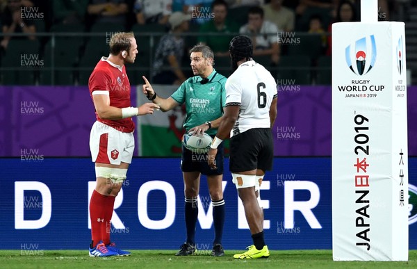 091019 - Wales v Fiji - Rugby World Cup - Alun Wyn Jones of Wales, Referee Jerome Garces and Leone Nakarawa of Fiji