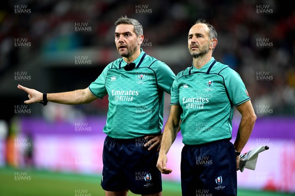 091019 - Wales v Fiji - Rugby World Cup - Referee Jerome Garces with assistant Romain Poite (right)