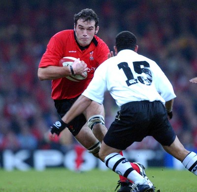 9-11-02. Wales v Fiji.  Wales' Robert Sidoli takes on Joseph Narruhn.  Picture: James Davies/