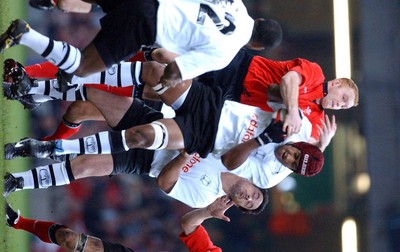 9-11-02. Wales v Fiji.  Wales' Martyn Williams challenges Alifereti Dovivareta.  Picture: James Davies/