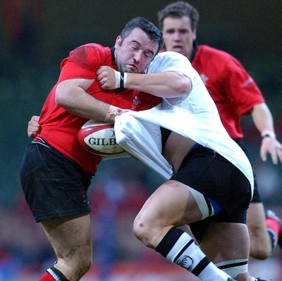 9-11-02. Wales v Fiji.  Wales' Mefin Davies bloodies his nose against Richard Nyholt.  Picture: James Davies/