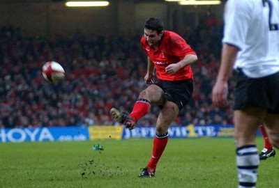 9-11-02 Wales v Fuji  Steven Jones puts another kick over for Wales.  