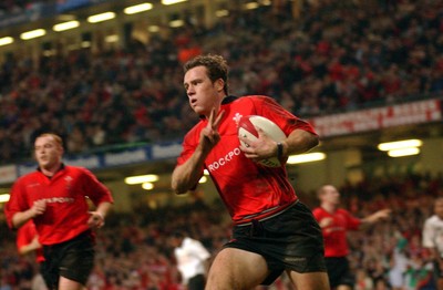 9-11-02. Wales v Fiji.  Wales' Mark Jones indicates his second try.  Picture: James Davies/