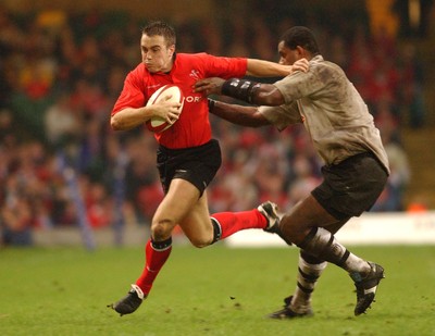 09.11.02  Wales v Fiji  Wales Rhys Williams hands off Alivereti Mocelutu   