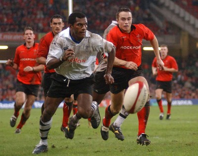 9-11-02 Wales v Fuji  Rhys Williams tries to beat Seremaia Bai to the ball.  