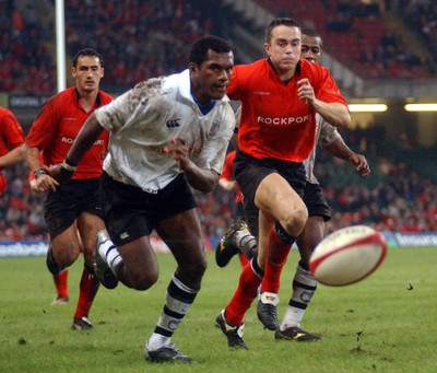 9-11-02 Wales v Fuji  Rhys Williams tries to beat Seremaia Bai to the ball.  