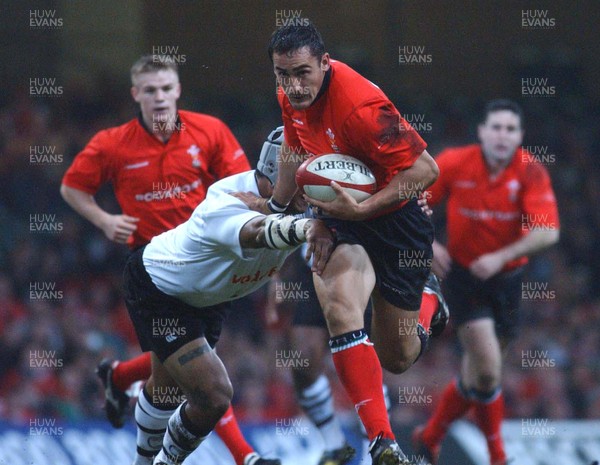 09.11.02  Wales v Fiji  Wales Sonny Parker beats tackle by Setareki Tawake  