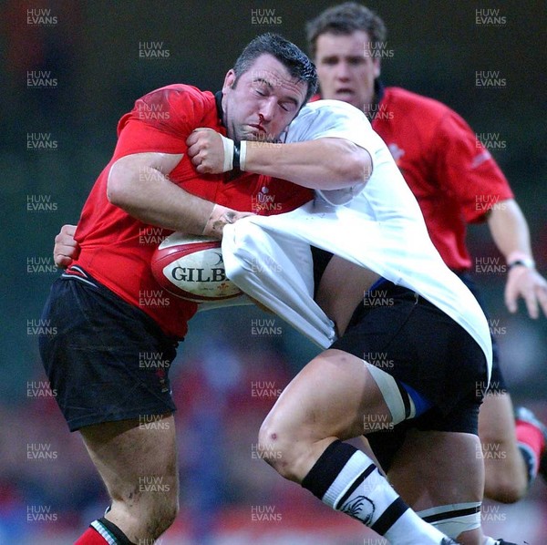 9-11-02. Wales v Fiji.  Wales' Mefin Davies bloodies his nose against Richard Nyholt.  Picture: James Davies/