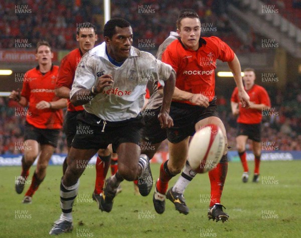 9-11-02 Wales v Fuji  Rhys Williams tries to beat Seremaia Bai to the ball.  