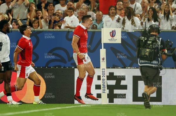 100923 - Wales v Fiji - Rugby World Cup 2023 - Pool C - Josh Adams of Wales celebrates scoring a try
