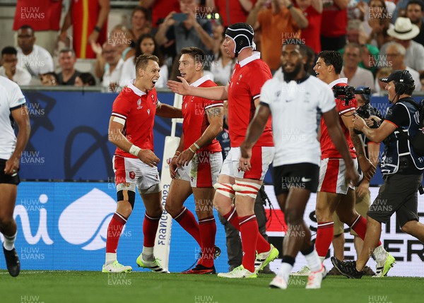 100923 - Wales v Fiji - Rugby World Cup 2023 - Pool C - Josh Adams of Wales celebrates scoring a try