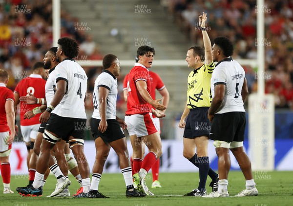 100923 - Wales v Fiji - Rugby World Cup 2023 - Pool C - Louis Rees-Zammit of Wales shows frustration towards Referee Matthew Carley 