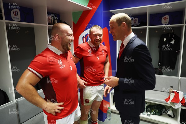 100923 - Wales v Fiji - Rugby World Cup 2023 - Pool C - HRH Prince William with Dillon Lewis and Tommy Reffell of Wales 