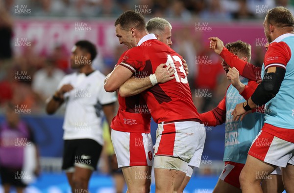 100923 - Wales v Fiji - Rugby World Cup 2023 - Pool C - George North of Wales celebrates scoring a try with Gareth Davies