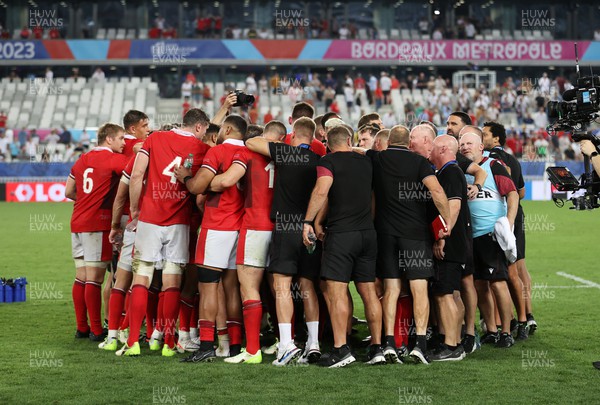 100923 - Wales v Fiji - Rugby World Cup 2023 - Pool C - Wales team huddle at full time
