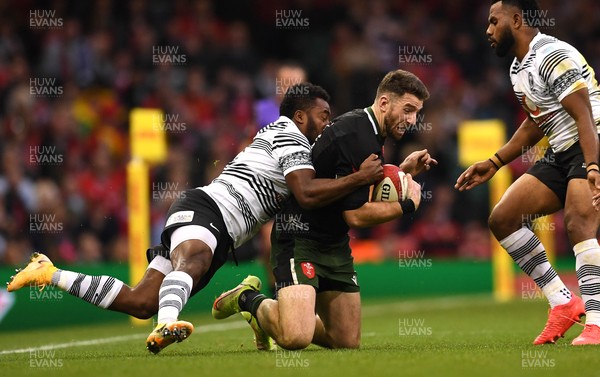 141121 - Wales v Fiji - Autumn Nations Series - Alex Cuthbert of Wales is tackled by Setareki Tuicuvu of Fiji