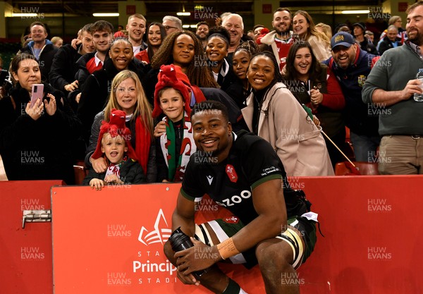 141121 - Wales v Fiji - Autumn Nations Series - Christ Tshiunza of Wales with family and friends at the end of the game