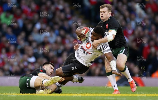141121 - Wales v Fiji - Autumn Nations Series - Josua Tuisova of Fiji is tackled by Johnny Williams and Nick Tompkins of Wales