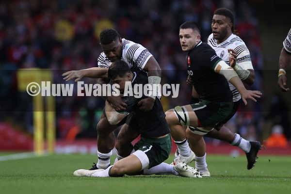141121 - Wales v Fiji - Autumn Nations Series - Louis Rees-Zammit of Wales is tackled by Josua Tuisova of Fiji