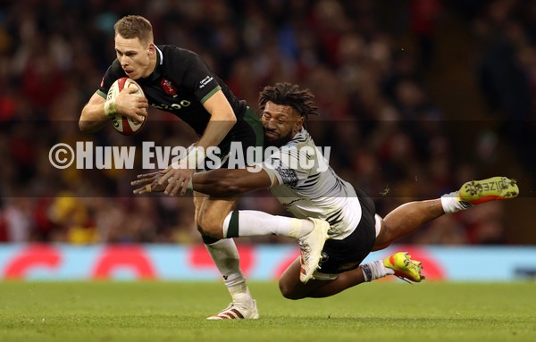 141121 - Wales v Fiji - Autumn Nations Series - Liam Williams of Wales is tackled by Waisea Nayacalevu of Fiji