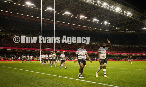 141121 - Wales v Fiji, Autumn Nations Series 2021 - Fijian players applaud the crowd during their lap of the Principality Stadium at the end of the match