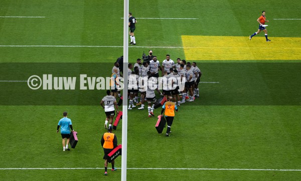 141121 - Wales v Fiji, Autumn Nations Series 2021 -  The Fijian team huddle together for the start of the match