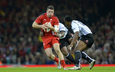 151114 - Wales v Fiji - Dove Men Series -Alex Cuthbert of Wales is tackled by Nemani Nadalo of Fiji