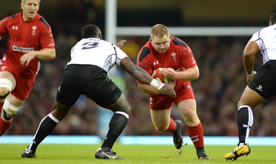 151114 - Wales v Fiji - Dove Men Series -Samson Lee of Wales is tackled by Manasa Saulo of Fiji