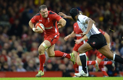 151114 - Wales v Fiji - Dove Men Series -Jamie Roberts of Wales gets past Akapusi Qera of Fiji